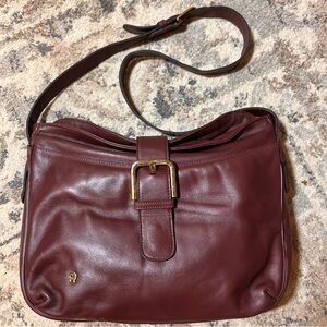 Vintage Etienne Aigner burgundy leather shoulder bag with brass logo & hardware.